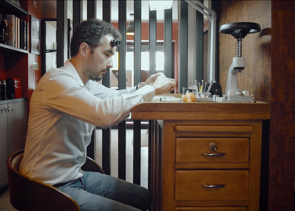 DWISS founder and desginer Rafael Simoes Miranda working on the watchmaking bench for the world's first watch design clue