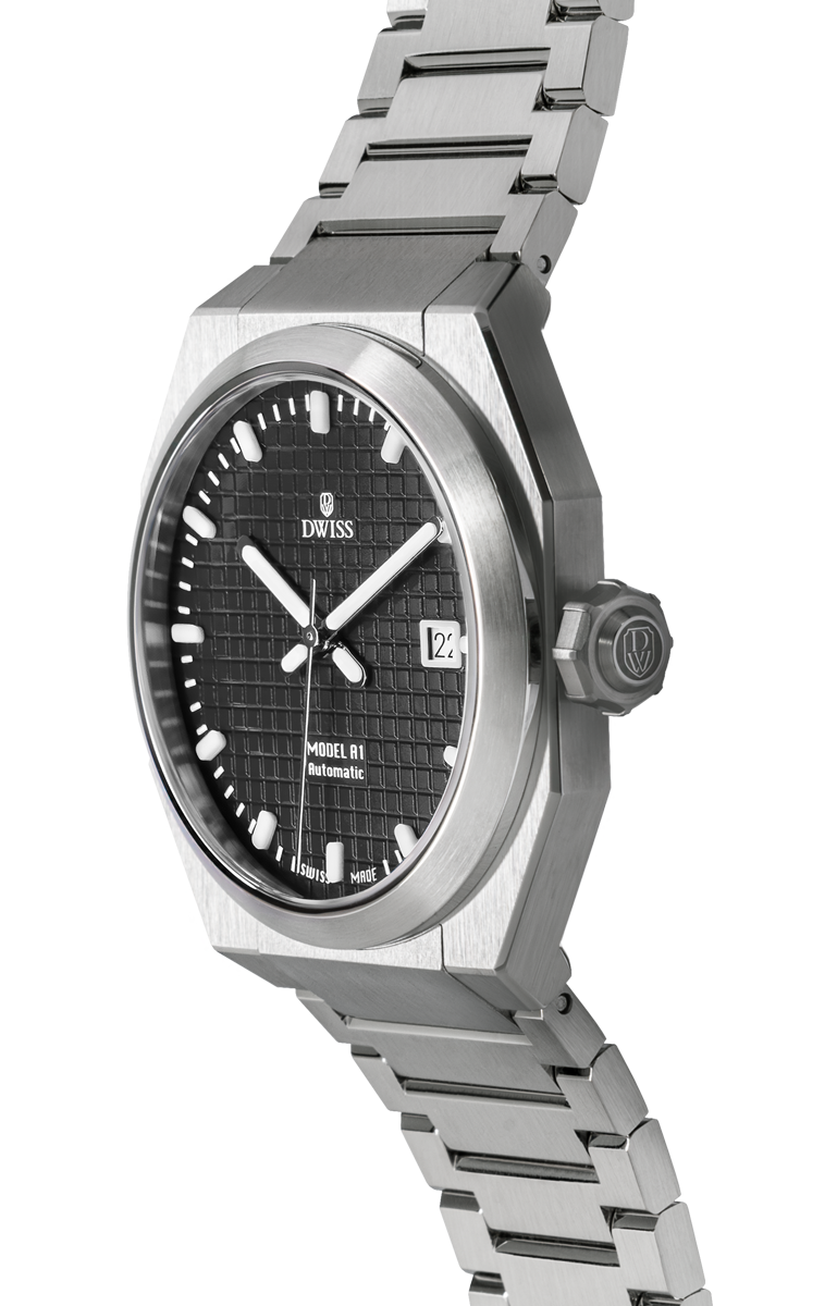 DWISS A1 - Black dial 3/4 picture
SWISS MADE AUTOMATIC WRIST WATCH 
68 hours power reserve and solid Super LumiNova® blocks
Dimension: 40 mm diameter wide, lug to lug 45,5 mm, 10,8 mm thickness.
Movement: Swiss made automatic movement 
La Joux-Perret G100 Soigné
Number of jewels: 24,
Frequency 4Hz – 28’800
Power reserve 68 hours
Case: 316L Stainless Steel.
Dial: Tapesserie Black with Super LumiNova® C1 X1 BL blocks
Luminous: Hands, Indexes and date window.
Glass (crystal): Sapphire crystal