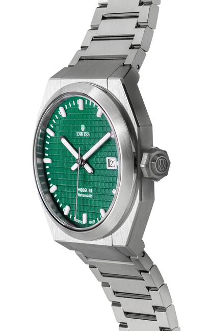 DWISS A1 - green dial 3/4 picture
SWISS MADE AUTOMATIC WRIST WATCH 
68 hours power reserve and solid Super LumiNova® blocks
Dimension: 40 mm diameter wide, lug to lug 45,5 mm, 10,8 mm thickness.
Movement: Swiss made automatic movement 
La Joux-Perret G100 Soigné
Number of jewels: 24,
Frequency 4Hz – 28’800
Power reserve 68 hours
Case: 316L Stainless Steel.
Dial: Tapesserie green with Super LumiNova® C1 X1 BL blocks
Luminous: Hands, Indexes and date window.
Glass (crystal): Sapphire crystal
