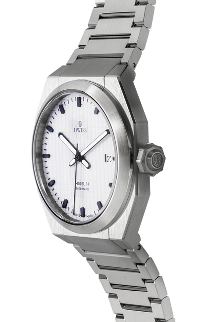 DWISS A1 - White dial 3/4 picture
SWISS MADE AUTOMATIC WRIST WATCH 
68 hours power reserve and solid Super LumiNova® blocks
Dimension: 40 mm diameter wide, lug to lug 45,5 mm, 10,8 mm thickness.
Movement: Swiss made automatic movement 
La Joux-Perret G100 Soigné
Number of jewels: 24,
Frequency 4Hz – 28’800
Power reserve 68 hours
Case: 316L Stainless Steel.
Dial: Tapesserie White with Super LumiNova® C1 X1 BL blocks
Luminous: Hands, Indexes and date window.
Glass (crystal): Sapphire crystal